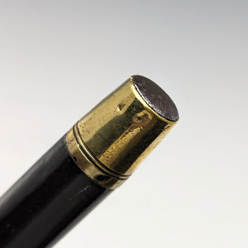 Circa 1925 British vintage gentleman's walking stick, made of sterling silver, round handle, black shaft, 86cm